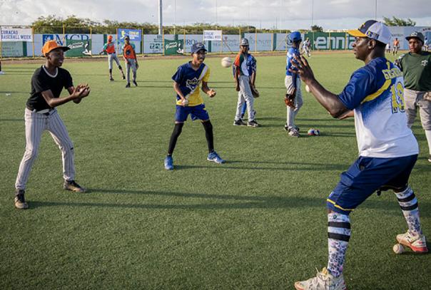 Curacao Baseball Week photo of players tossing a baseball