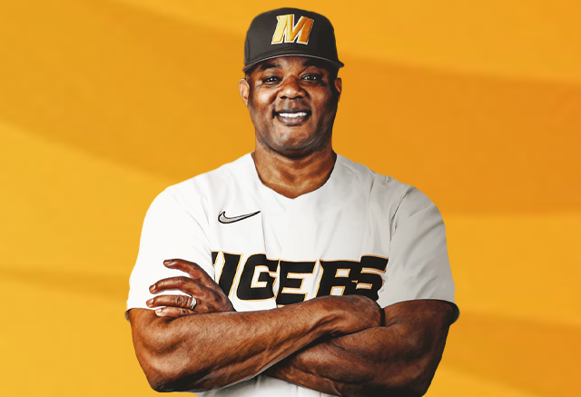 Kerrick Jackson headshot in Missouri baseball white jersey with yellow tiger stripe background